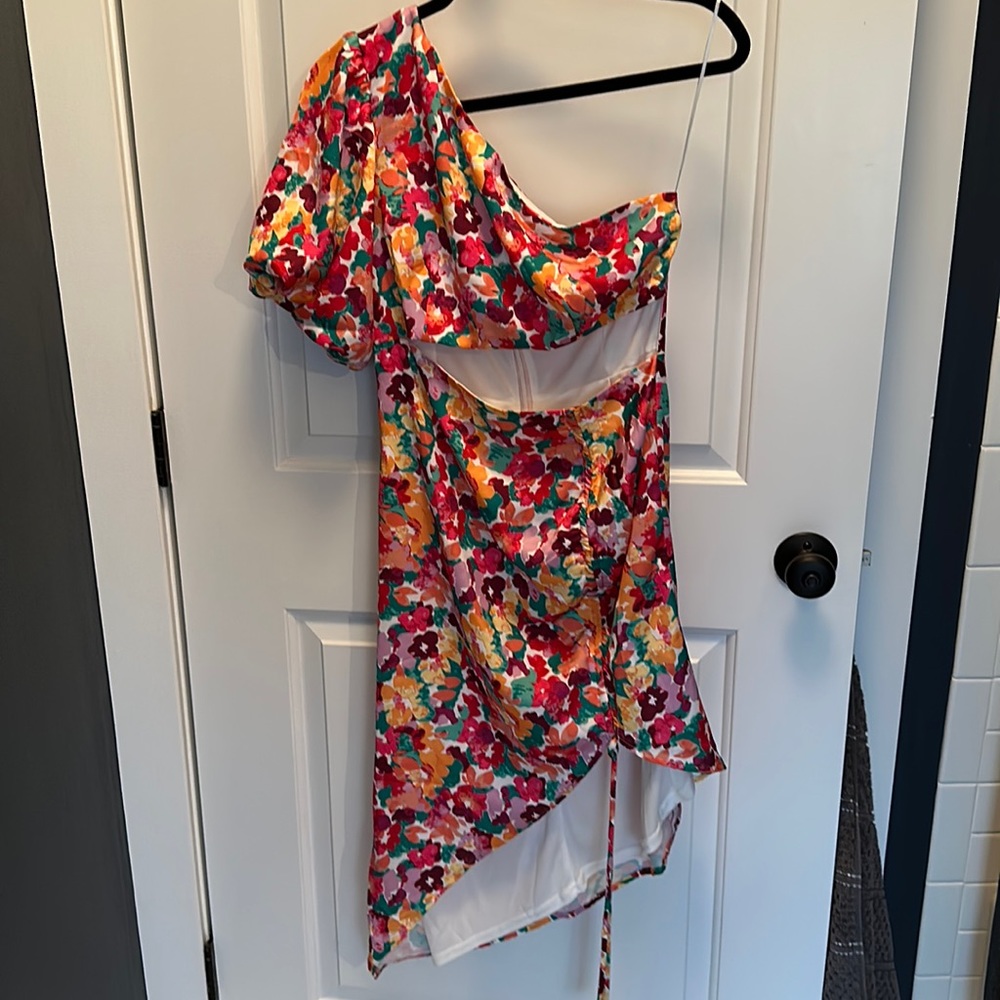 Cut out. One shoulder. High low dress.